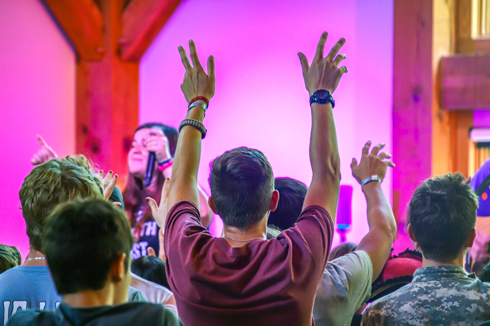 HandsRaisedInChapel